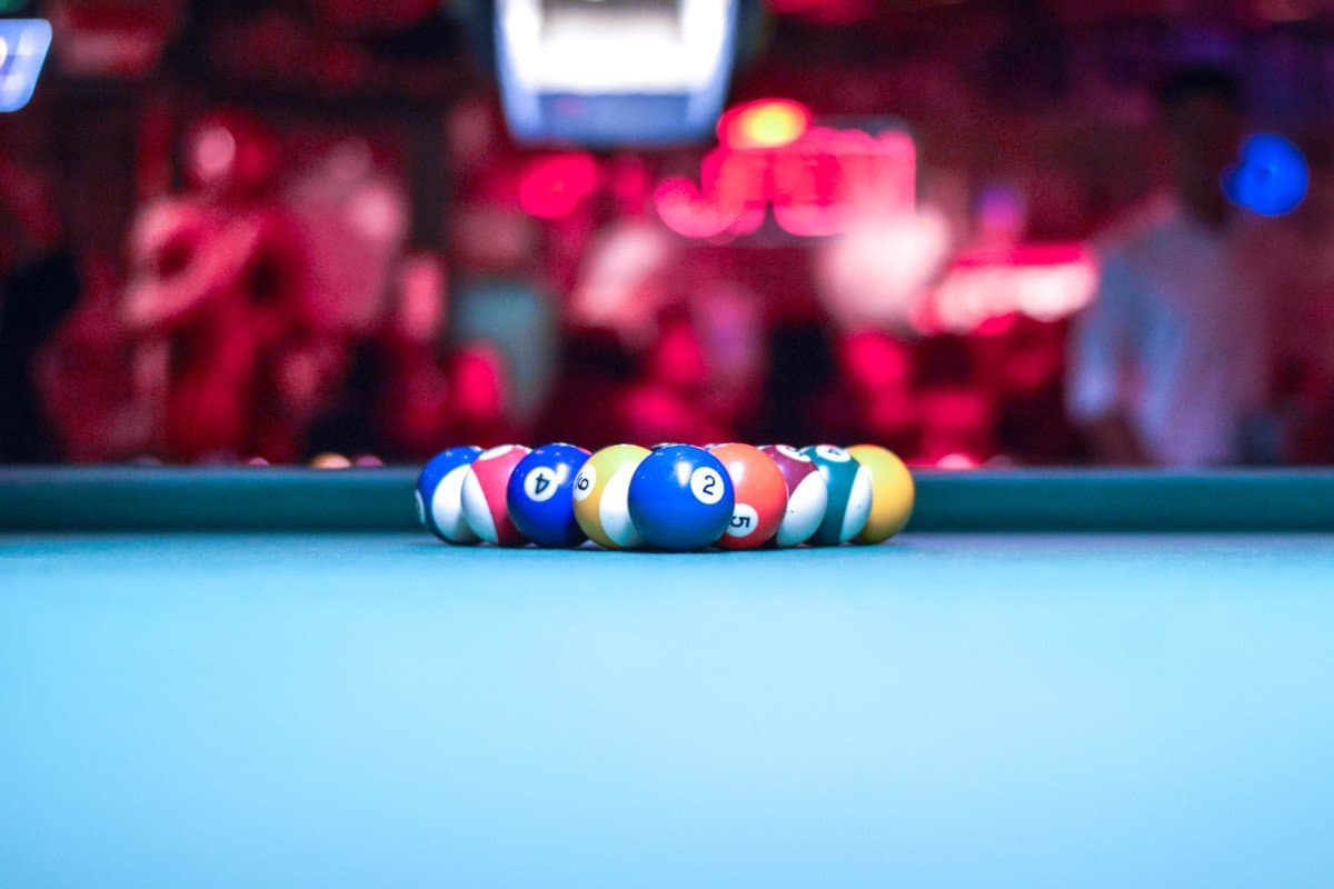 pool balls in front of bright lights