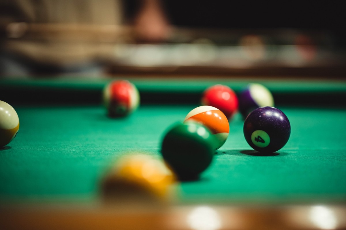 Close up Billiard Balls on green pool table