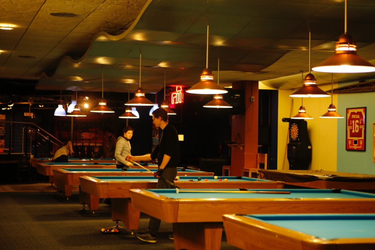 Pool hall with players